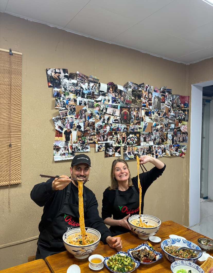 Clients enjoying authentic noodles in Guangzhou